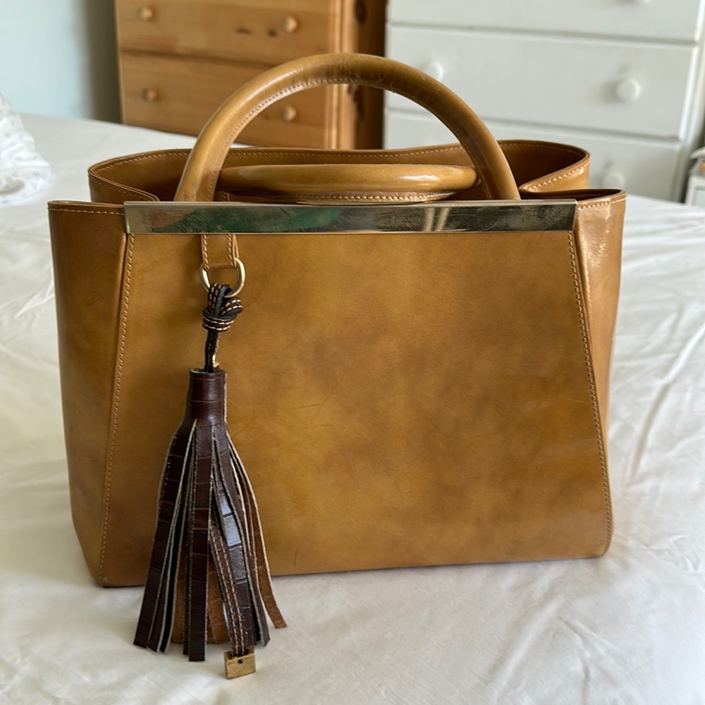 Camel color leather handbag